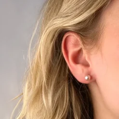 6 mm rosa perleøreringe i 14 karat guld