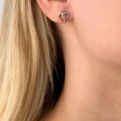 Hjerte diamant ørestikker i 14 karat guld og hvidguld med diamant